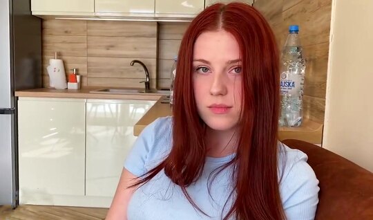 The red-haired chick coolly sucks the guys dick in the home kitchen 